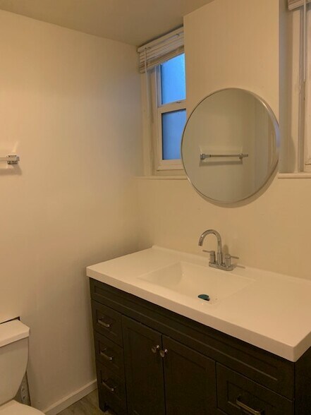 Master bedroom bathroom vanity. - 24606 University Ave