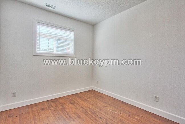Building Photo - 3 Bed, 3.5 Baths Townhome With Garage Level Suite and Office Space