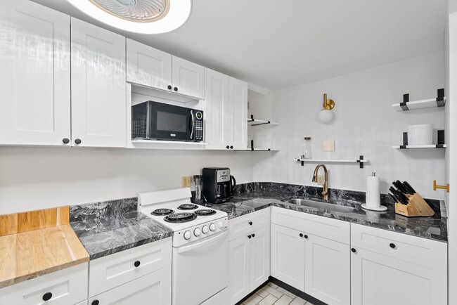 kitchen from door to sink - 413 N Cayuga St