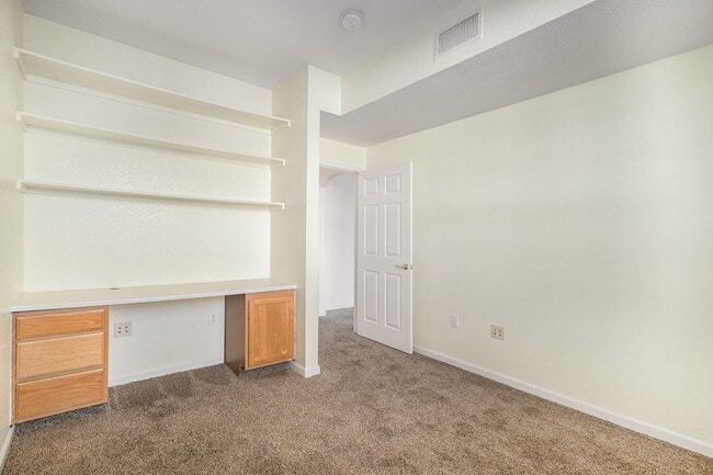 Building Photo - Bright 2-Bedroom Condo with Private Patio & Resort-Style Amenities!