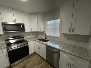 Building Photo - ANNUAL RENTAL - VISTAS AT HERITAGE BAY - 2 BED + DEN/ 2.5 BATH TOWNHOUSE