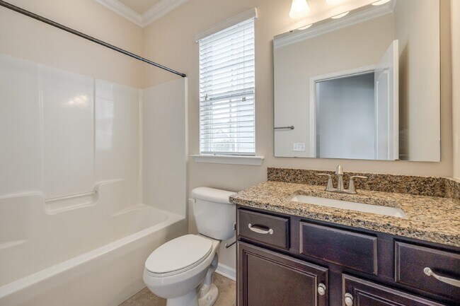 Building Photo - "Spacious 4-Bedroom Retreat with 3 Full Ba...