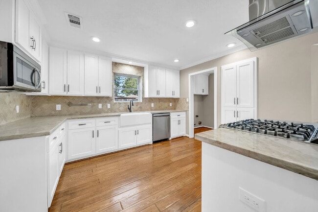 Building Photo - Welcome to this stunning 4-bedroom, 2.5-bath home on a quarter of an acre lot nestled in the high...