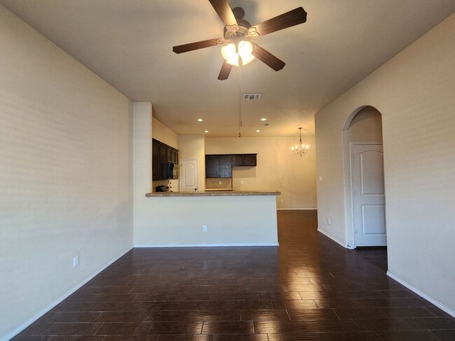 Building Photo - Wood Like Tile Flooring & Vinyl Plank - No Carpet / 1 Story Unit/ Fenced in Yard / Interior Washe...