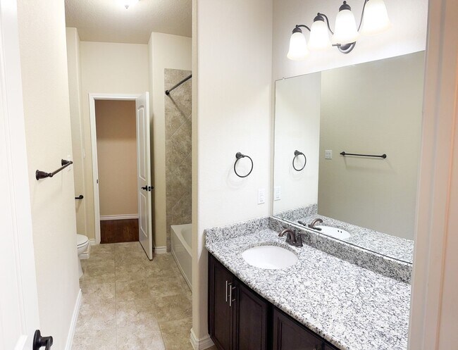 Building Photo - Popular DR Horton Sierra floor plan. 4 bed, 2 1/2 bath, 3 car garage, single story on a corner lo...