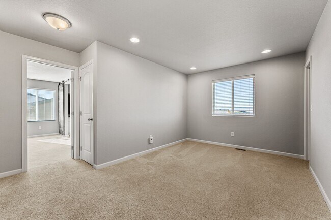 Building Photo - Spacious Home with Central AC and Fenced Yard