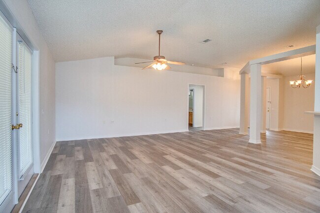 Building Photo - Lakefront Living in Gulf Breeze – Spacious...