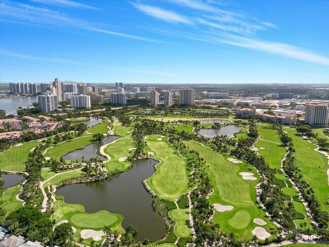 Building Photo - 20201 E Country Club Dr