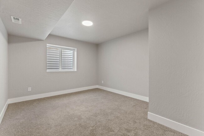 Building Photo - Newly built 4 Bedroom Duplex With Garage