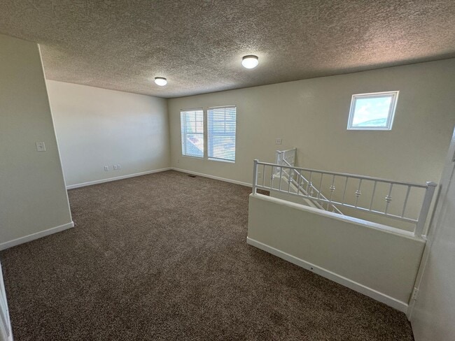 Building Photo - Spacious 2-Story Home with 3-Car Garage in...