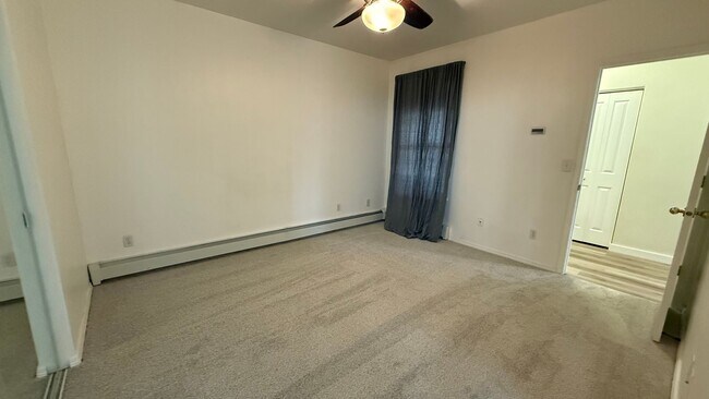 Building Photo - Major Updates! Raised Ranch Style Condo wi...