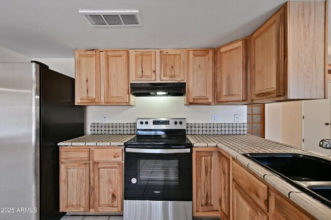 Building Photo - 8444 W Montecito Ave