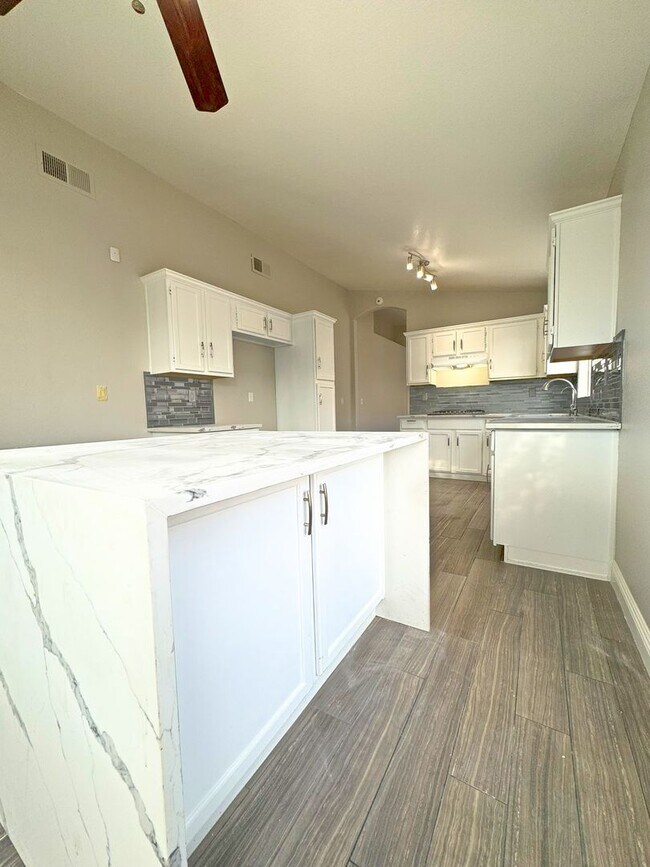 Building Photo - Fully renovated with a contemporary flair ...