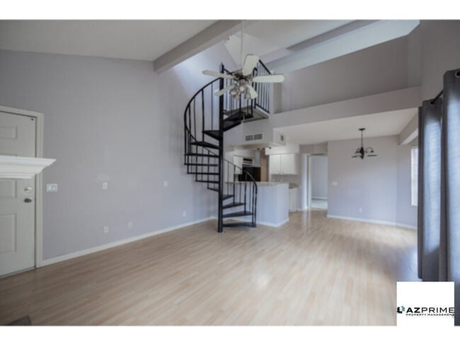 Building Photo - Live elevated in this premium upper-level ...