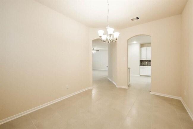 Building Photo - Beautiful stone front 4 bedroom, 3 bath home has bay windows in breakfast nook & master. It is on...