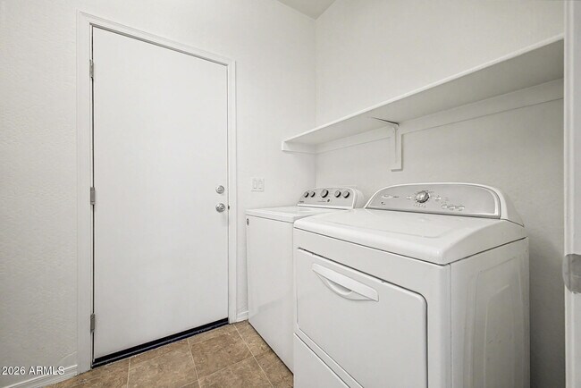Building Photo - 1432 N 80th Dr
