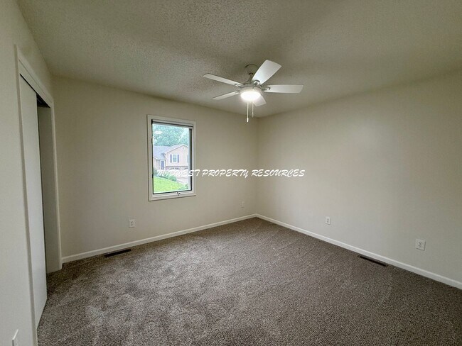 Building Photo - Spacious 3 Bedroom Home with Finished Basement, Covered Deck & Fenced Yard