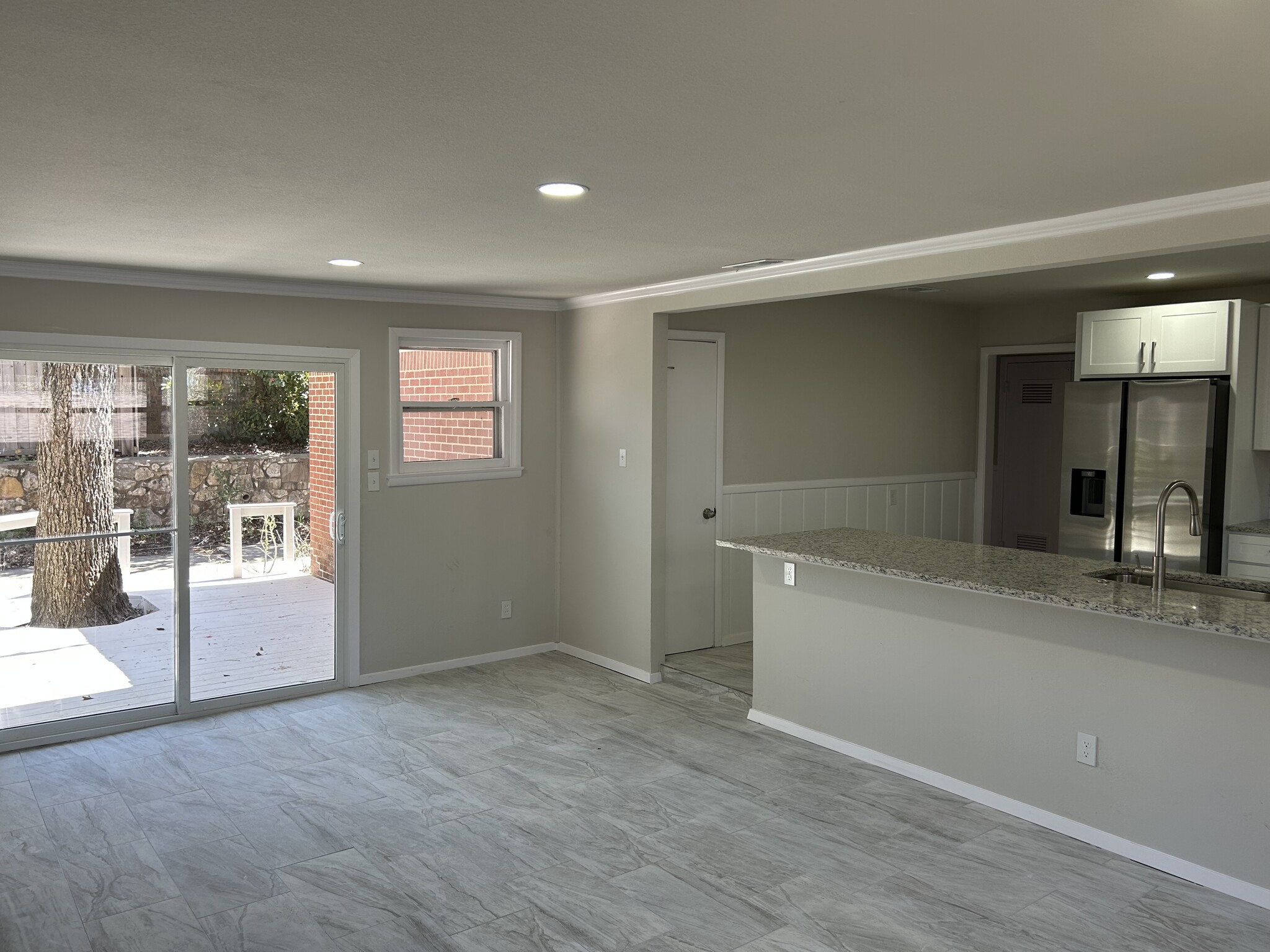 View from Dining Room into patio and Kitchen - 3404 Martin Lydon Ave