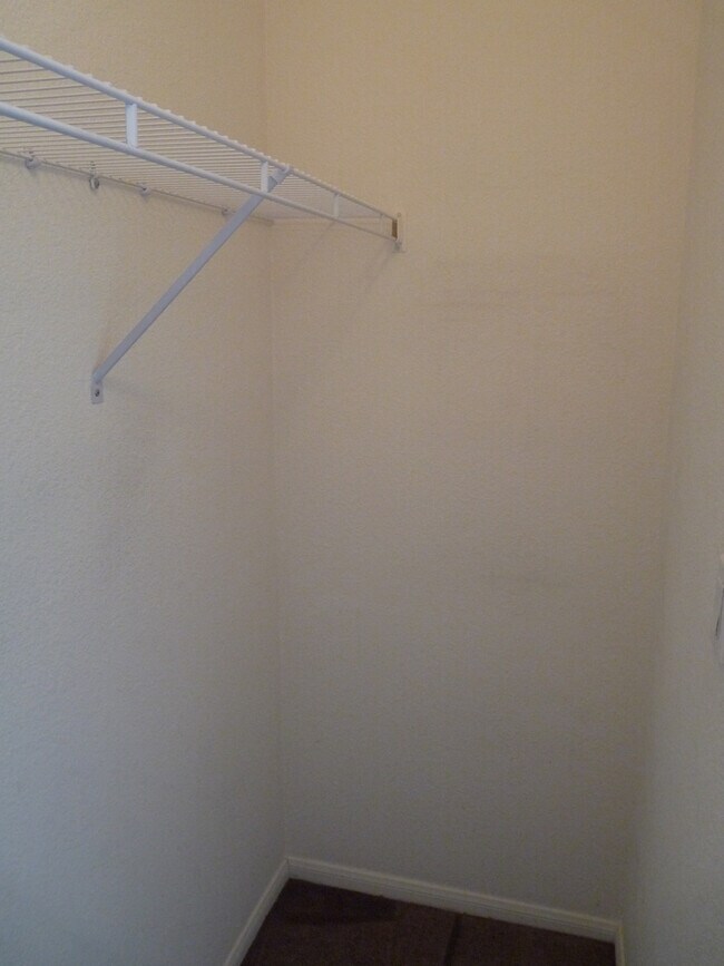 Building Photo - GATED 2 BEDROOM, 2 BATH CONDO IN JASMINE RANCH COMMUNITY