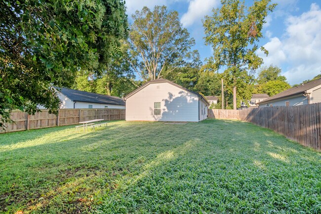 Building Photo - LIVE CLOSE TO THE ACTION — Modern 3-Bedroom Rental in Charlotte’s Reid Park!
