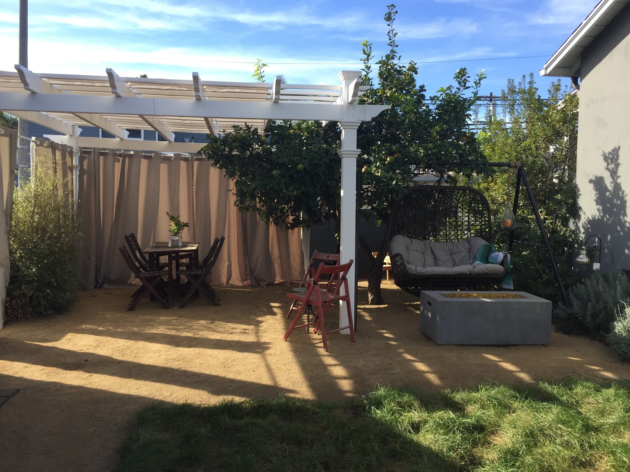 Exterior with fire pit - 701 Flower Ave