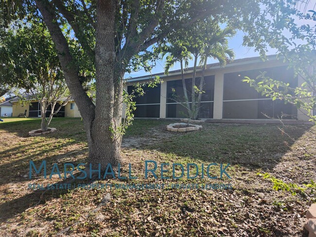 Building Photo - Single Family Home in Cape Coral - 4 Bedro...