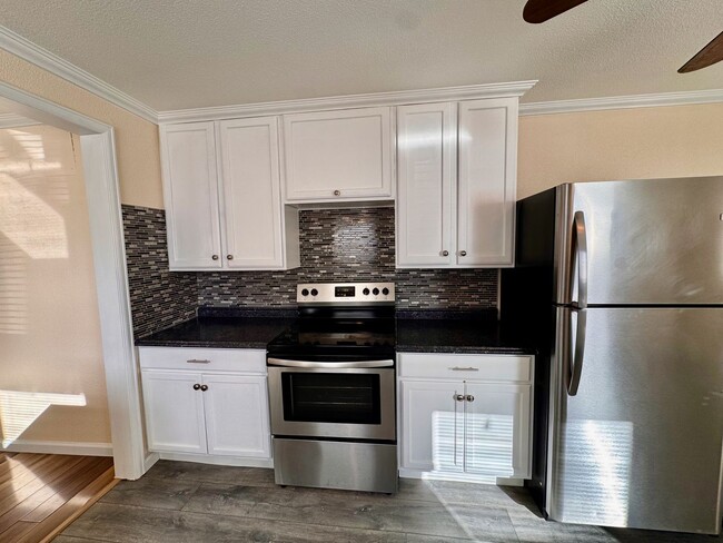 Building Photo - Move-In Ready 4BR Home with Finished Basement, Flex Space & Large Yard