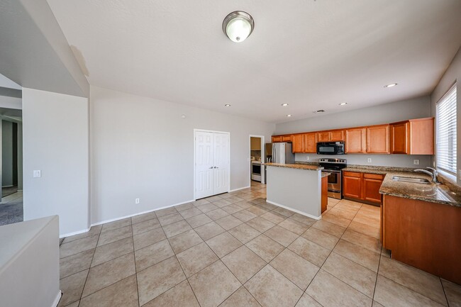 Building Photo - Welcome to this spacious 4 bedroom, 2.5 ba...