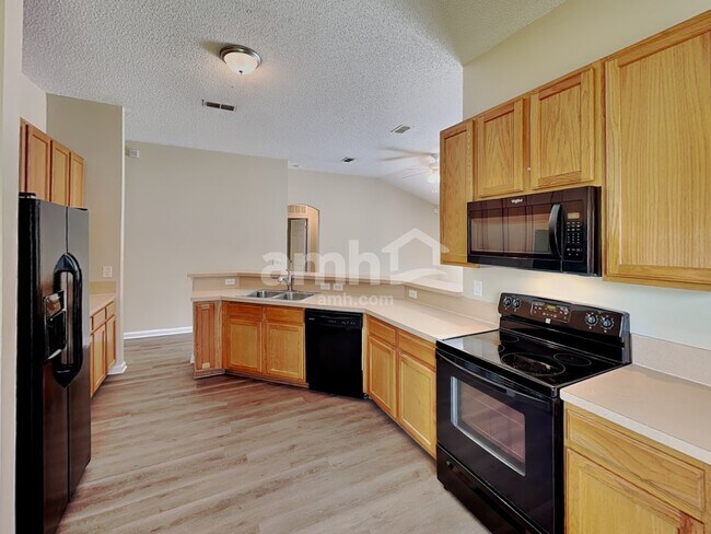 Building Photo - 6486 Hannah Stables Dr