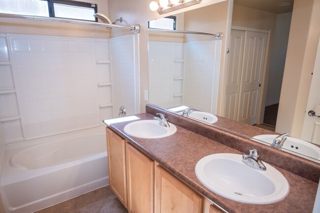 Building Photo - Gorgeous 3 Bedroom 2 Bathroom Home with Tile Throughout! Central A/C, 2 Car Garage!