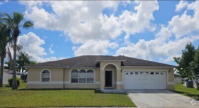 Building Photo - NICE!   LARGE 4 BEDROOM / 2 BATH / 2 CAR G...