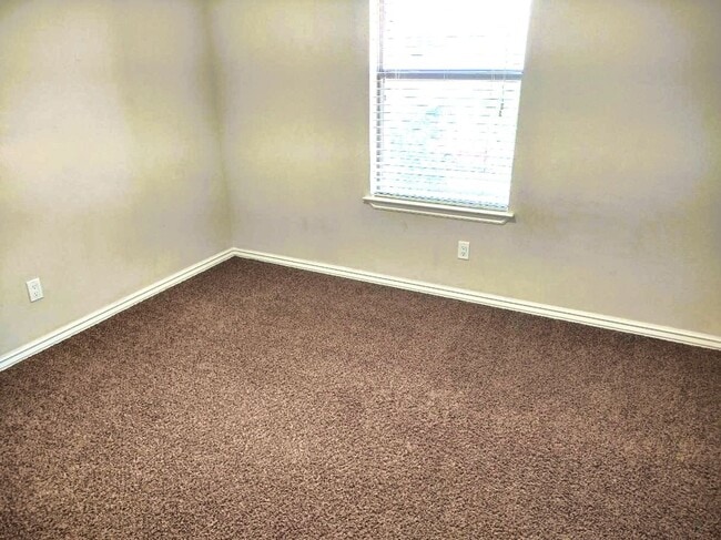 Building Photo - Dazzling Two Story Westside Home With Refrigerated Air Located In Quiet Neighborhood