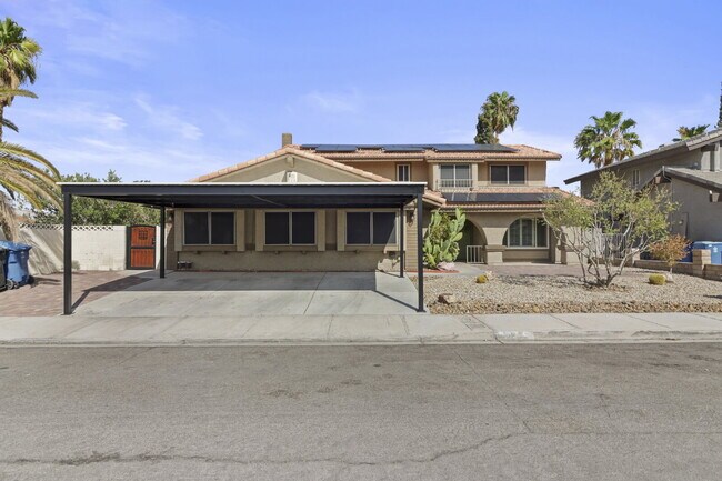 Building Photo - Welcome to your entertainers dream home with solar and pool service included!