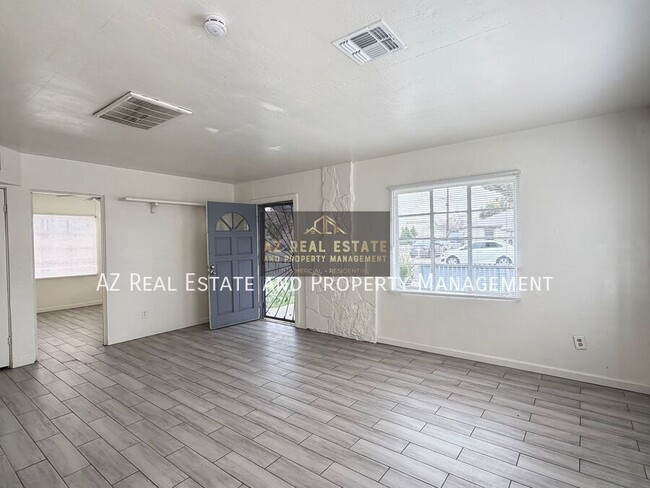 Building Photo - 7210 N 55th Dr