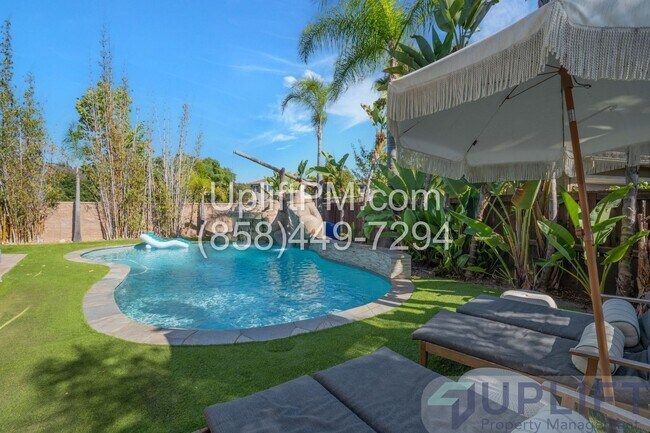 Building Photo - Spacious 5-Bedroom Home with Pool & Spa in...