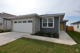 Building Photo - Welcome to this beautiful modern-style 4-b...