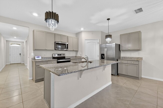 Building Photo - Available Now in Tavares | 2023 Built 4BR/2BA Home with 2-Car Garage