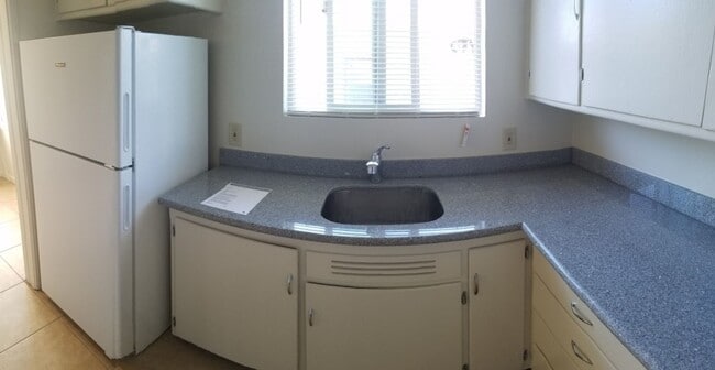 Building Photo - Renovated 1-Bedroom with Garage Parking & ...