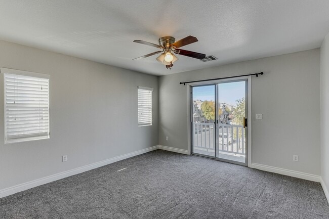 Building Photo - Gated Townhome with Strip Views from the Balcony!