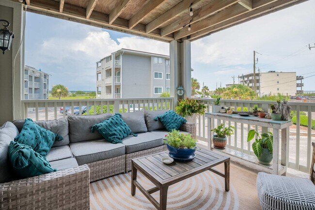 Building Photo - OFF-SEASON FURNISHED OASIS JUST STEPS FROM THE SAND