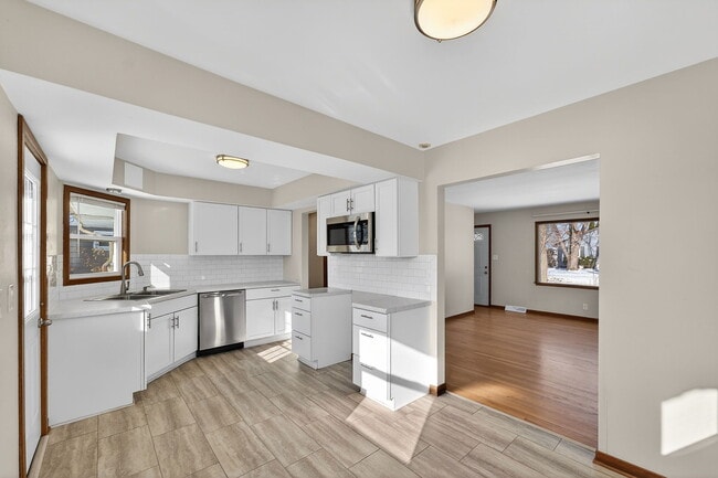 Updated kitchen with dishwasher & microwave - 10525 W Custer Ave