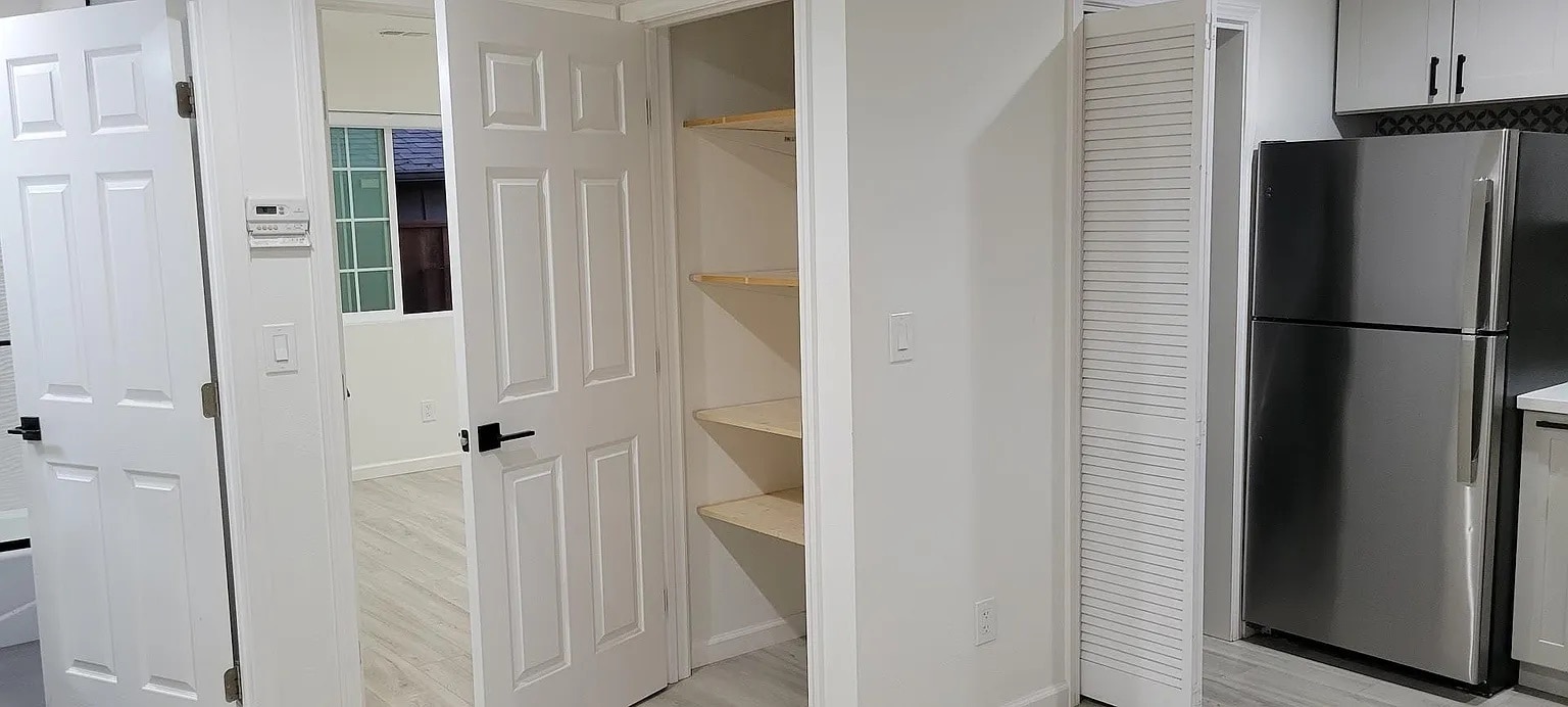 Doors to bath, bed, pantry, and laundry. - 438 Minor Ave