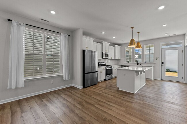 Building Photo - Stunning 3BR Home with Spacious Open Layout, Community Pool & Playground