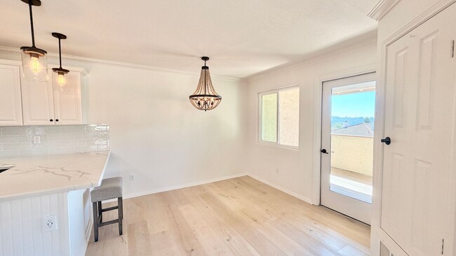 Building Photo - Beautifully Remodeled and Updated Upstairs Condo Unit in the Private & Gated Vista Way Village Co...