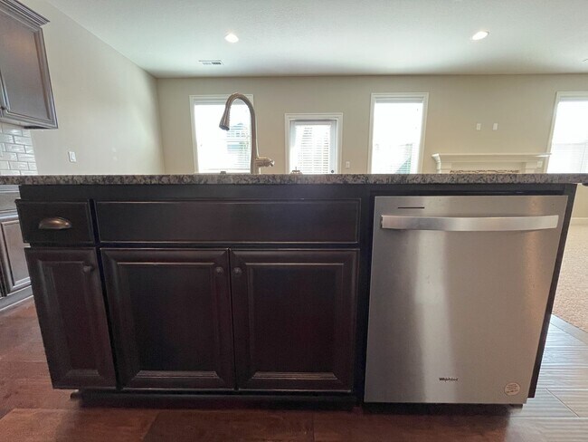 Building Photo - Spacious 4-Bedroom + Bonus Room with Modern Kitchen, Solar Panels & Private Fenced Backyard!