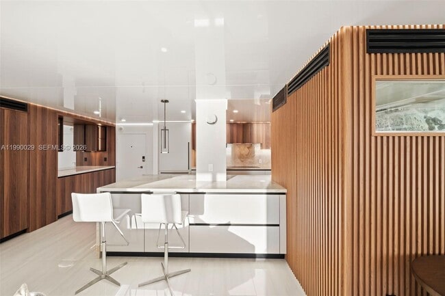 Building Photo - 5555 Collins Ave