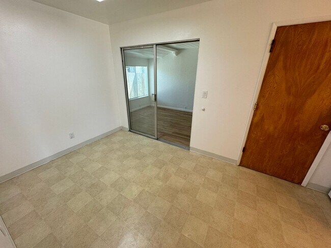 Building Photo - 3 Bed / 1 Bath | Del Dayo Duplex Available 08/10/2026
