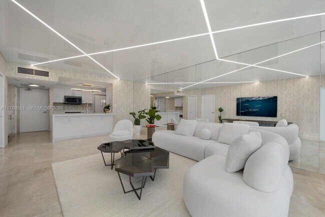 Building Photo - 10275 Collins Ave