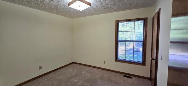 Building Photo - 303 Cacique Ct