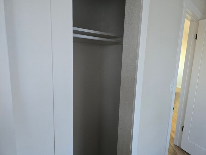 Upstairs closet. - 902 S Zephyr Ct